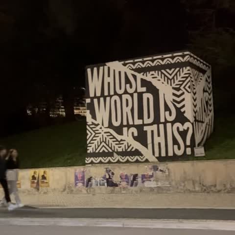 Graffiti reading Whose World Is This, Lisbon